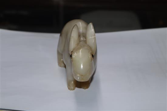 A 19th century Chinese white jade figure of a rabbit, glass inset eyes